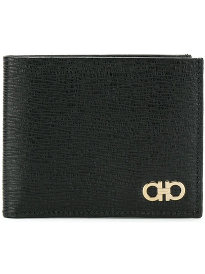 Shop Ferragamo Gancini Bi-fold Wallet In Black