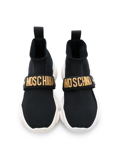 Shop Moschino Logo Strap Sock Sneakers In Black