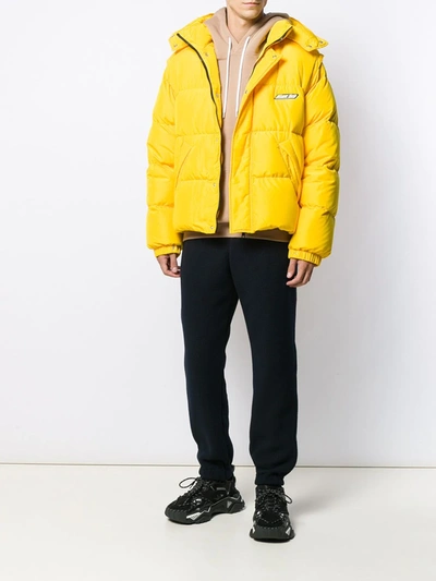 Shop Msgm Zipped Padded Jacket In Yellow