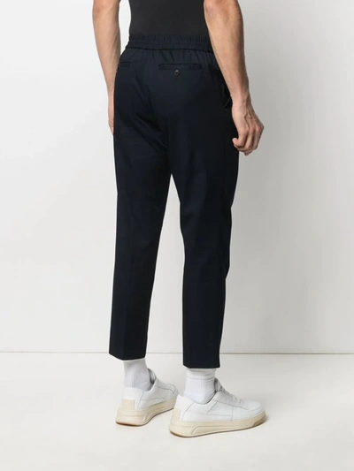 Shop Ami Alexandre Mattiussi Elasticated-waist Cropped Trousers In Blue