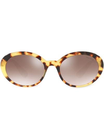 Shop Miu Miu Oval Tortoiseshell Sunglasses In Brown