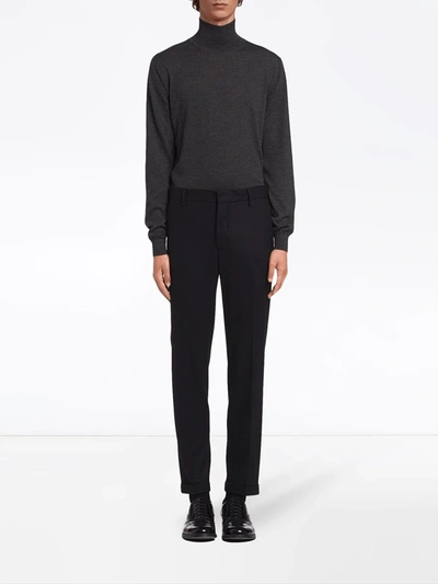 Shop Prada Jersey Trousers In Black