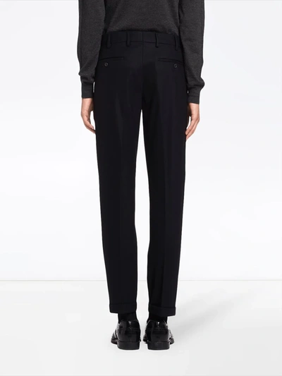 Shop Prada Jersey Trousers In Black