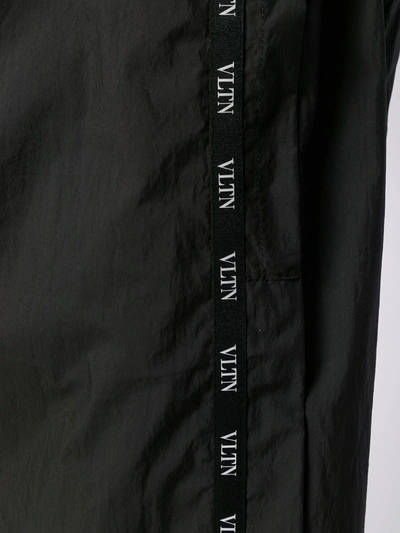 Shop Valentino Vltn Stripe Shorts In Black