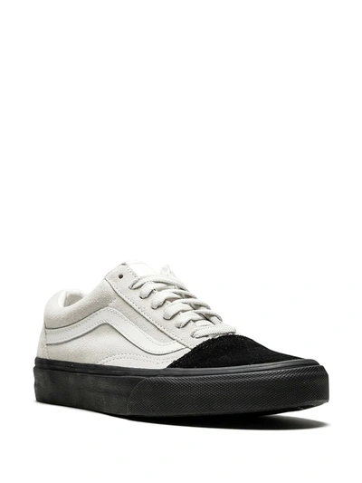 Shop Vans Old Skool Low-top Sneakers In White