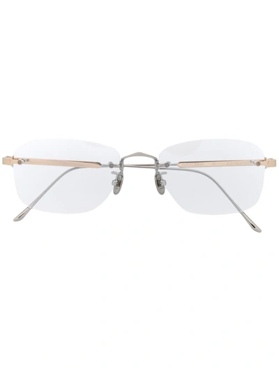 Shop Cartier Frameless Oval Glasses In White