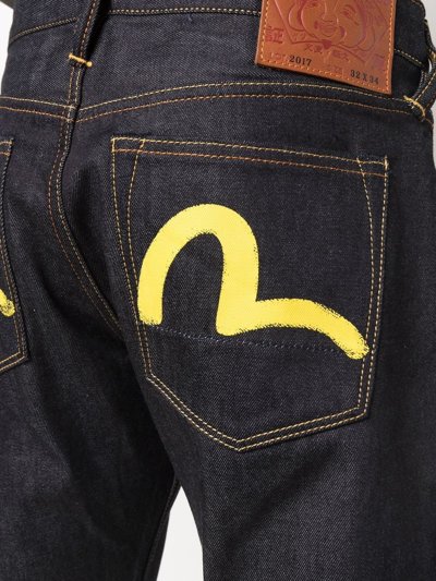 Shop Evisu Rear Logo-print Jeans In Blau