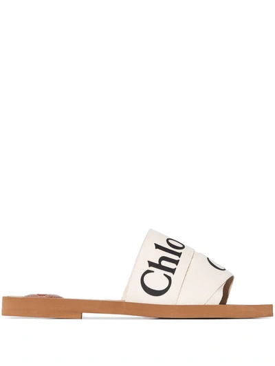 Shop Chloé Woody Logo Strap Slides In White