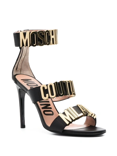 Shop Moschino Logo-letter Leather Sandals In Black