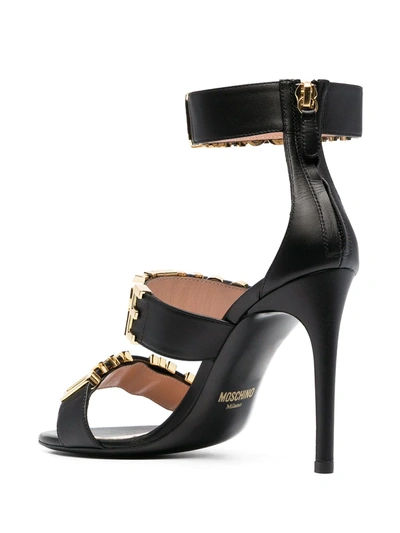 Shop Moschino Logo-letter Leather Sandals In Black