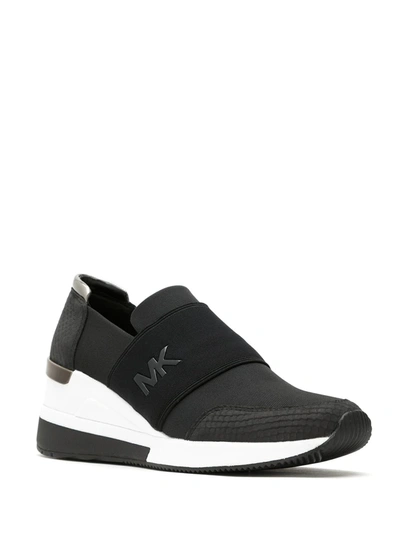 Shop Michael Michael Kors Felix Sneakers In Black