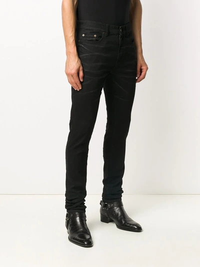 Shop Saint Laurent Five-pocket Skinny Jeans In Black