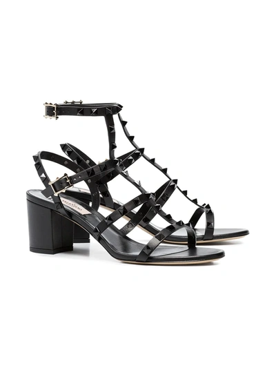 Shop Valentino Rockstud Sandals In Black