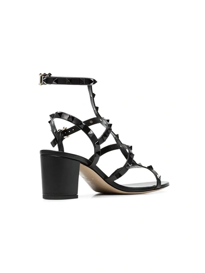 Shop Valentino Rockstud Sandals In Black