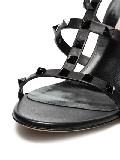 Shop Valentino Rockstud Sandals In Black