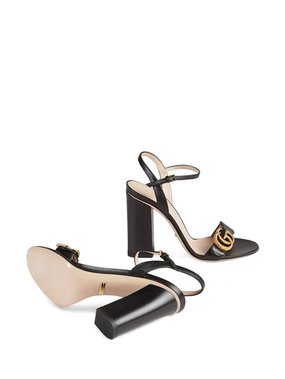 Shop Gucci Gg Logo-plaque Sandals In Black