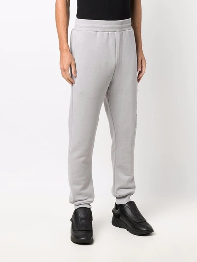 A-cold-wall* Embossed Logo Trackpants In 灰色