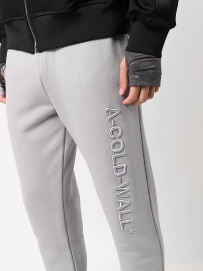Shop A-cold-wall* Embossed Logo Trackpants In 灰色