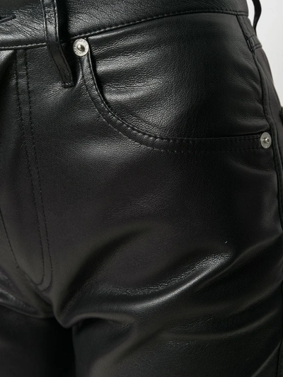 Shop Nanushka Faux-leather Trousers In Black