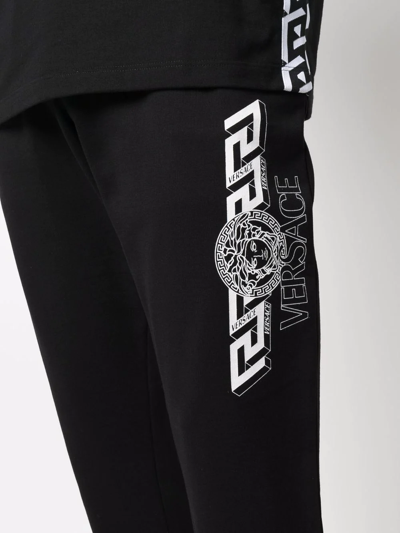Shop Versace Greca-detail Track Pants In Black