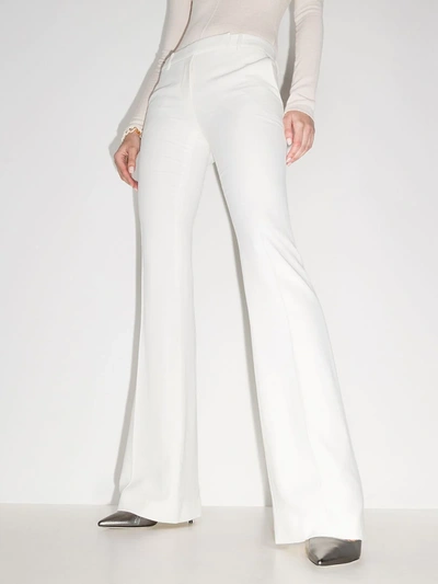 Shop Alexander Mcqueen Mid-rise Flared Trousers In White