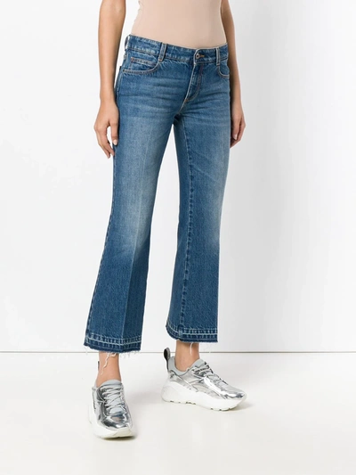 Shop Stella Mccartney Cropped Flared Jeans In Blue