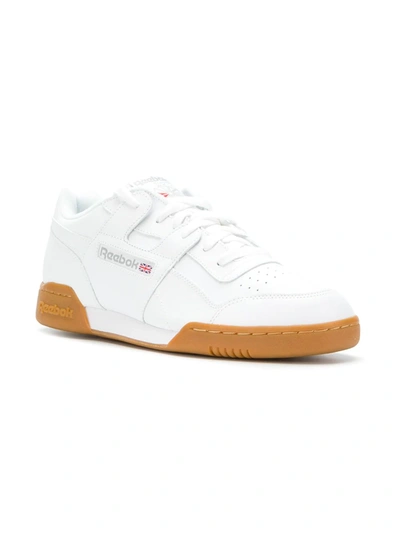 Shop Reebok Classic Lace-up Sneakers In White