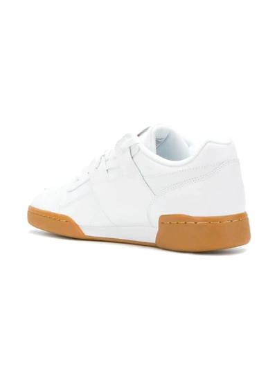 Shop Reebok Classic Lace-up Sneakers In White