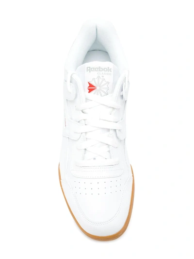 Shop Reebok Classic Lace-up Sneakers In White