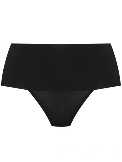 Shop Spanx Undie-tectable Mid-rise Thong In Black