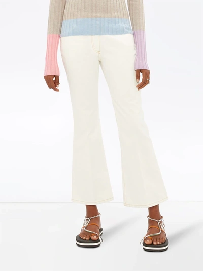 Shop Jw Anderson Skinny Flared Jeans In White