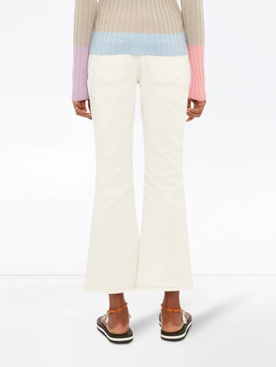 Shop Jw Anderson Skinny Flared Jeans In White