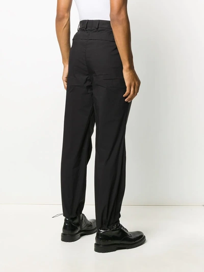 Shop Givenchy Drawstring Hems Trousers In Black