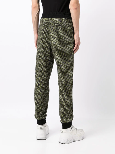 Shop Versace La Greca Track Pants In Grün