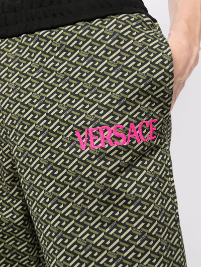 Shop Versace La Greca Track Pants In Grün