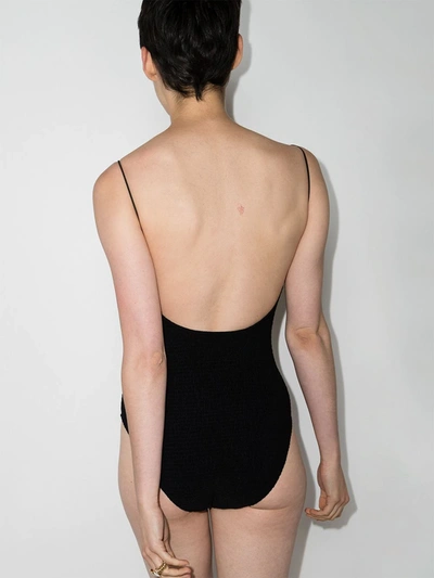 Shop Totême Smocked-details Swimsuit In Black