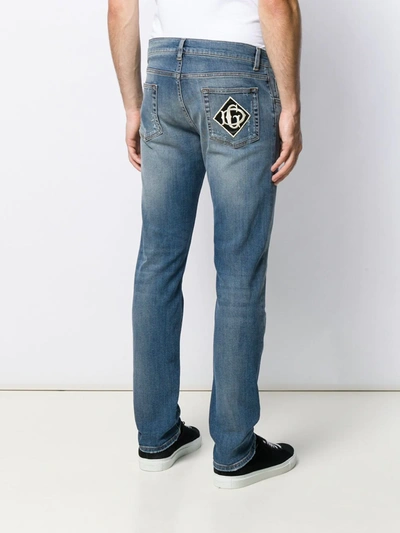 Shop Dolce & Gabbana Distressed Slim Jeans In Blue