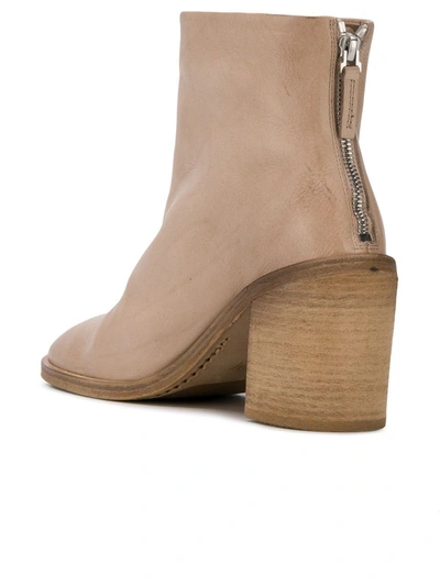 zipped high ankle boots