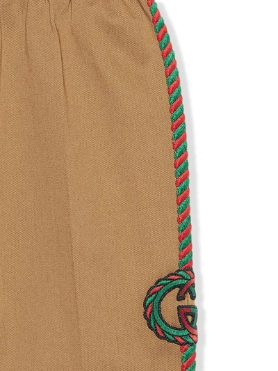 Shop Gucci Embroidered Chinos In Neutrals