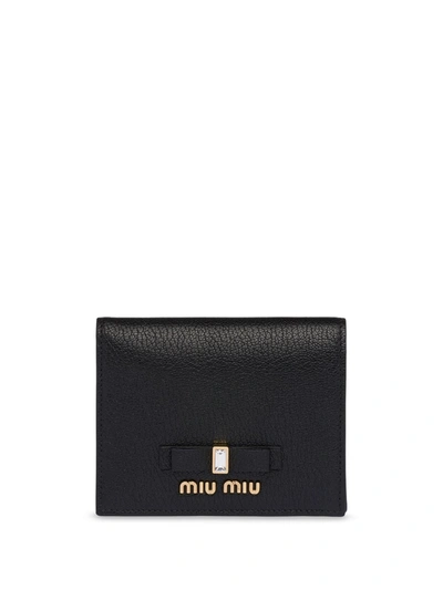 Shop Miu Miu Bow Compact Wallet In Black