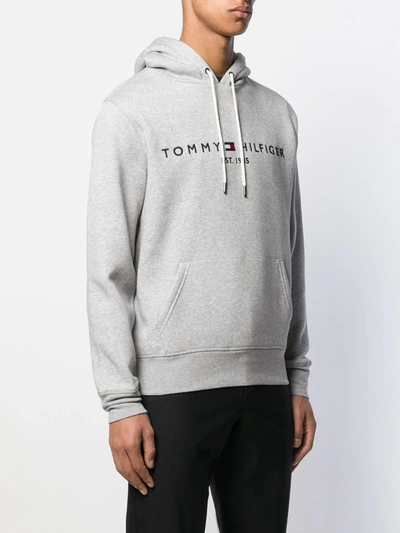 Shop Tommy Hilfiger Logo Embroidered Hoodie In Grey