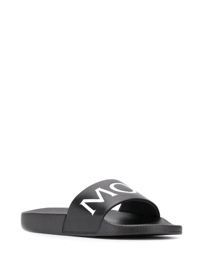 Shop Moncler Logo Embossed Slides In Black