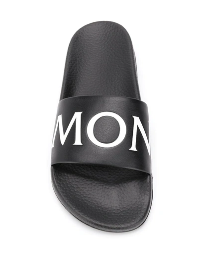 Shop Moncler Logo Embossed Slides In Black