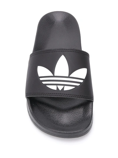 Shop Adidas Originals Adilette Lite Slides In Black