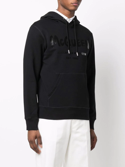 Shop Alexander Mcqueen Graffiti Logo-print Hoodie In Black