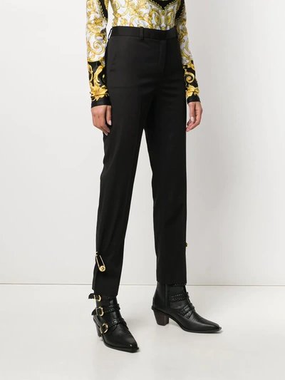 Shop Versace Medusa Safety Pin Trousers In Black