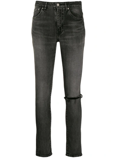 Shop Saint Laurent Ripped Knee Skinny Jeans In Grey