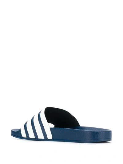 Shop Adidas Originals Adilette Slides In Blue