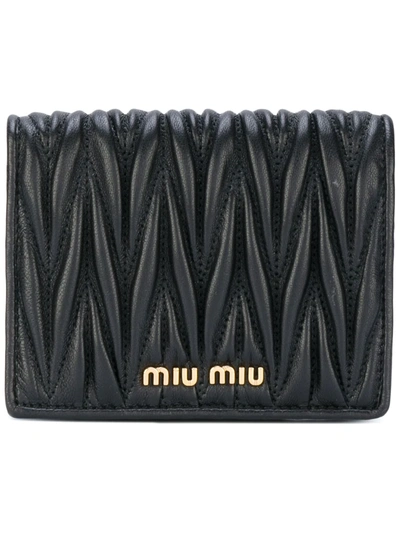 Shop Miu Miu Fold Out Purse In Black