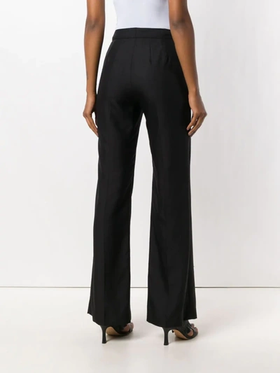 Shop Talbot Runhof Creased Flared Trousers In Black